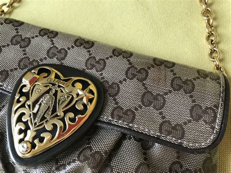 gucci heart clutch